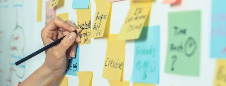 Whiteboarding ideas on sticky notes