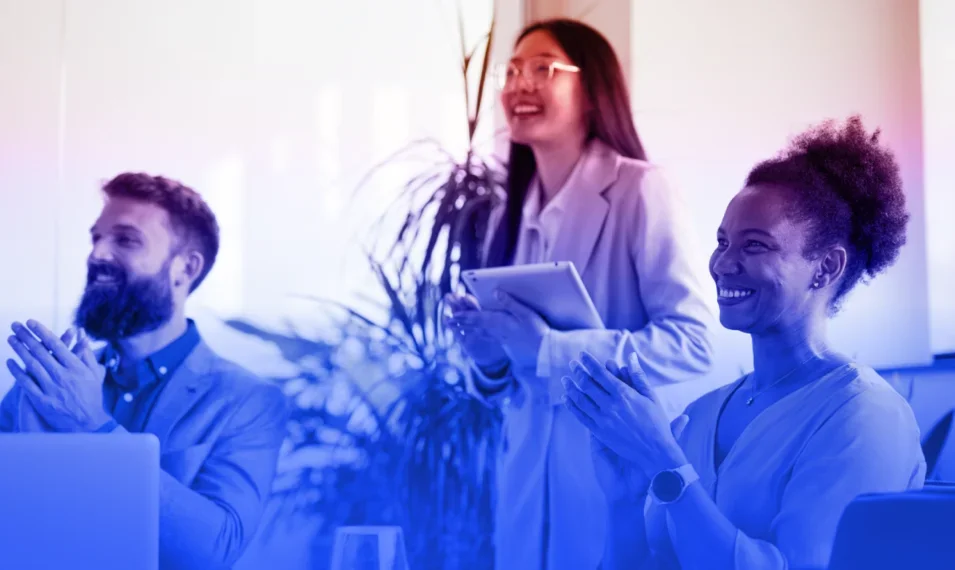 three work colleagues celebrating their achievement together